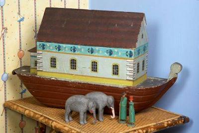 Wooden toy boat with people and animal figures